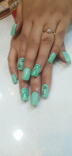 Mint floral nail art